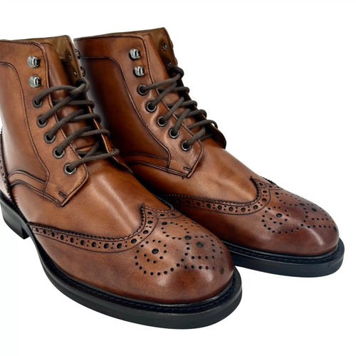 Anfibio artigianale con pelliccia agnello cucito blake